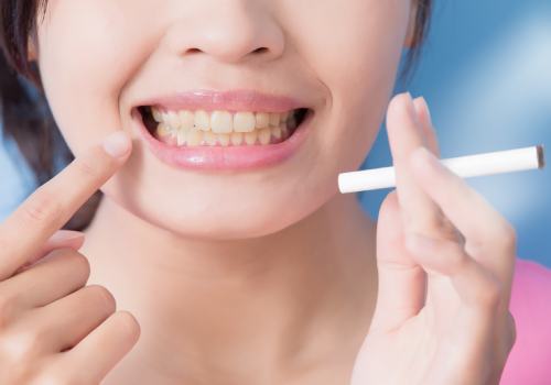Можно ли курить после имплантации зуба